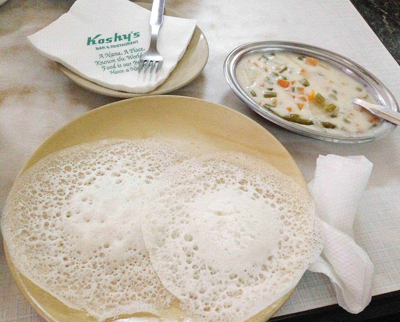 Palappam served with vegetable stew