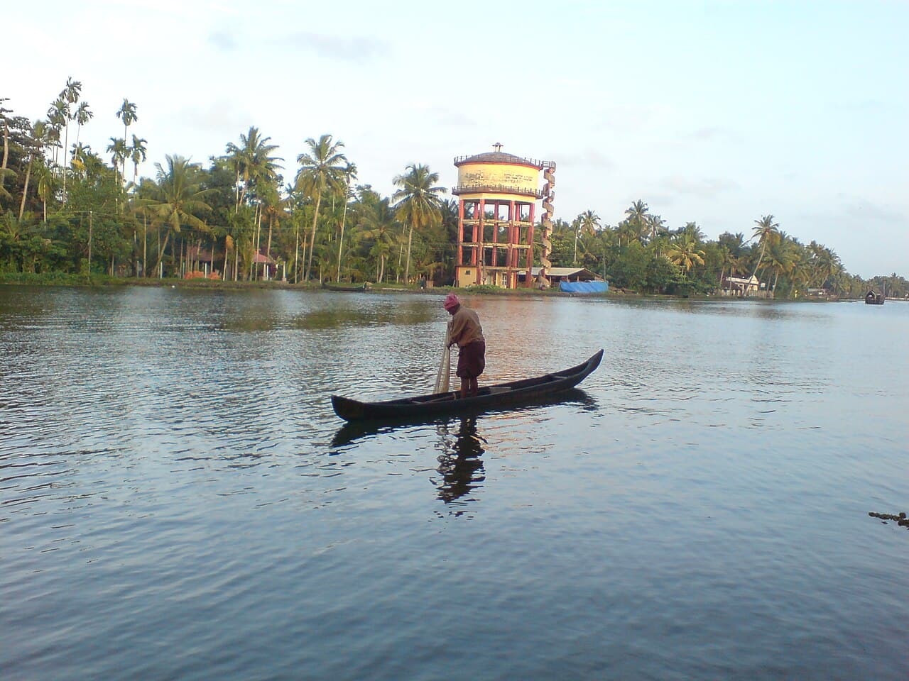 Fishermen casting nets at sunrise